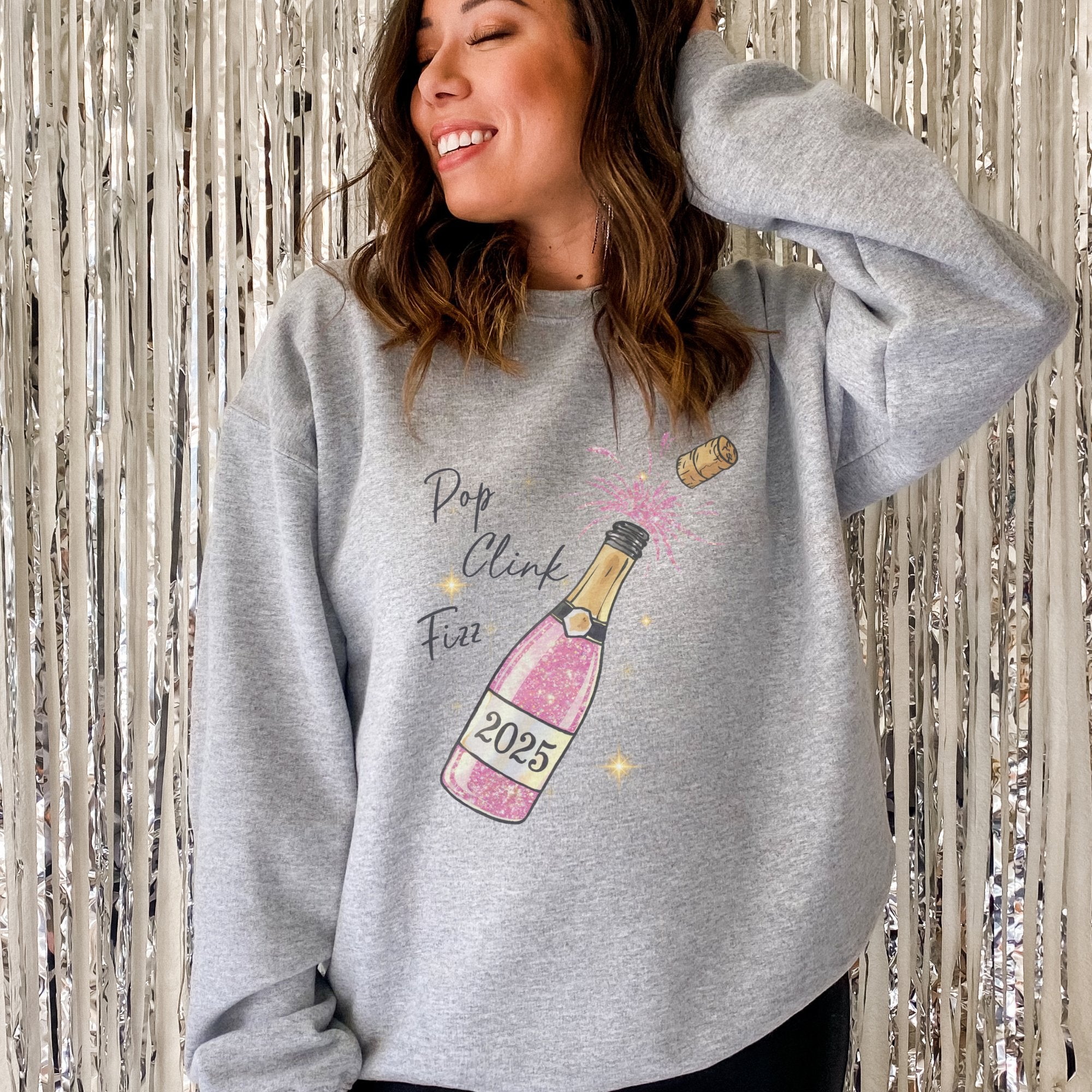 2025 New Year's Eve Pop Clink Fizz Women's Sweatshirt - Trendznmore