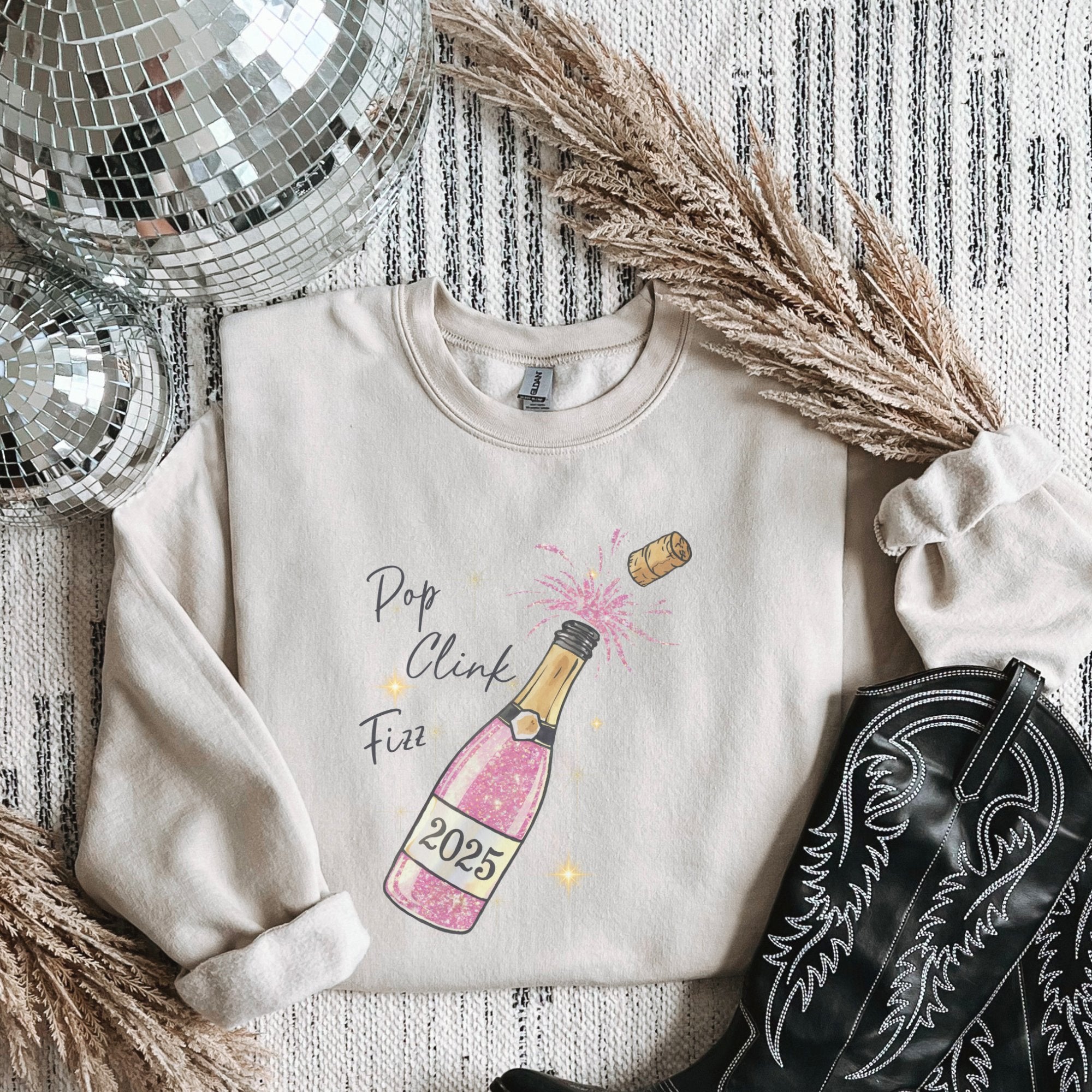 2025 New Year's Eve Pop Clink Fizz Women's Sweatshirt - Trendznmore