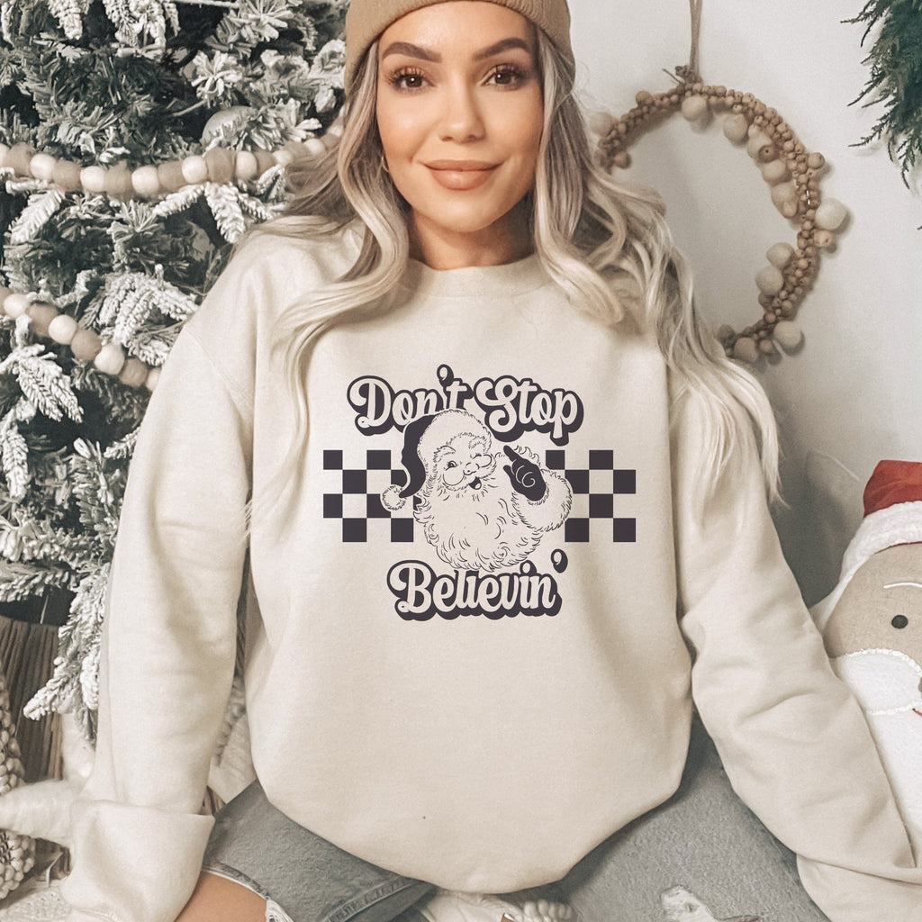 Don't Stop Believin' in Black Christmas Women's Sweatshirt - Trendznmore