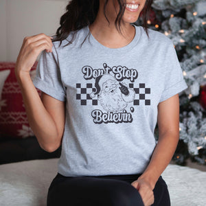 Don't Stop Believin' in Black Christmas Women's T-shirt - Trendznmore