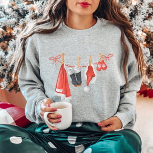 Santa suit clothes line Christmas Sweatshirt - Trendznmore